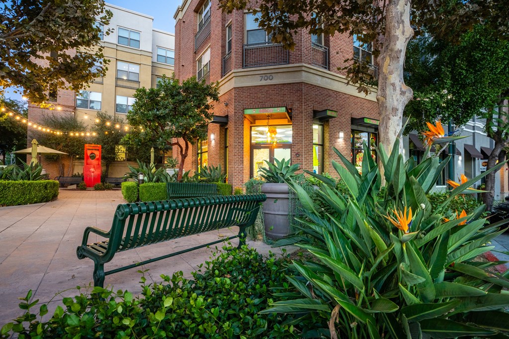 a park bench in front of a building