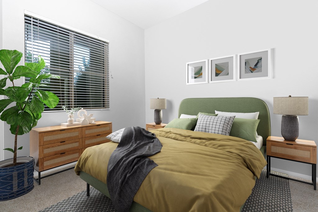 a bedroom with a bed and a dresser and a window