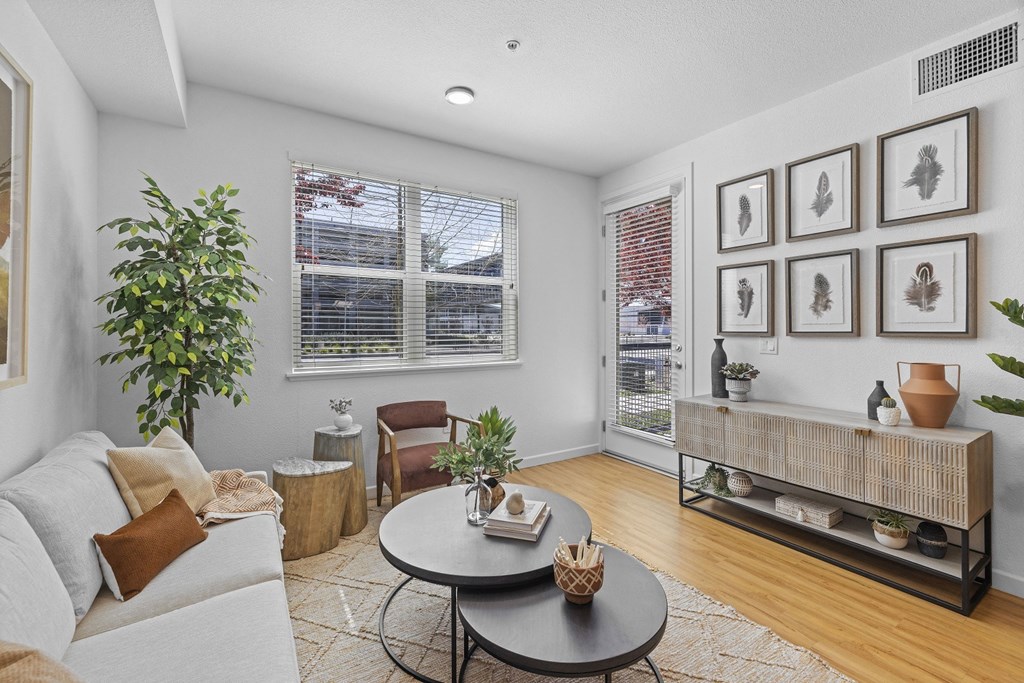 The Edge Milpitas CA a living room with a couch and a coffee table