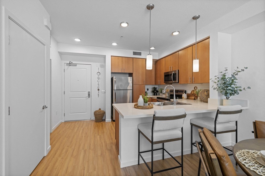 The Edge Milpitas CA a kitchen and dining area in a 555 waverly unit