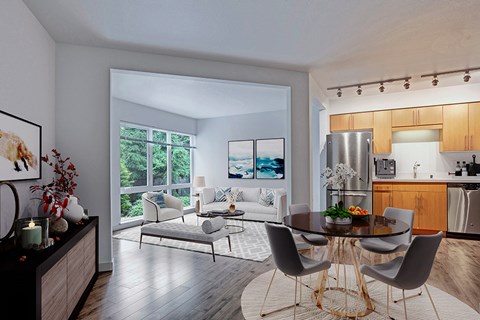 A modern dining room with a glass table and chairs.