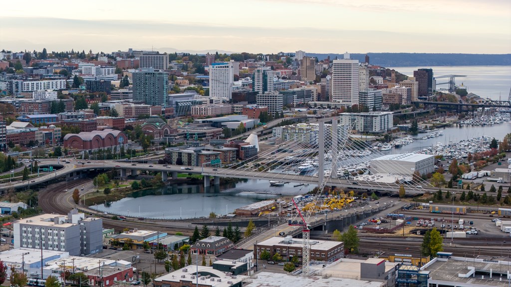 A cityscape with a river running through it.