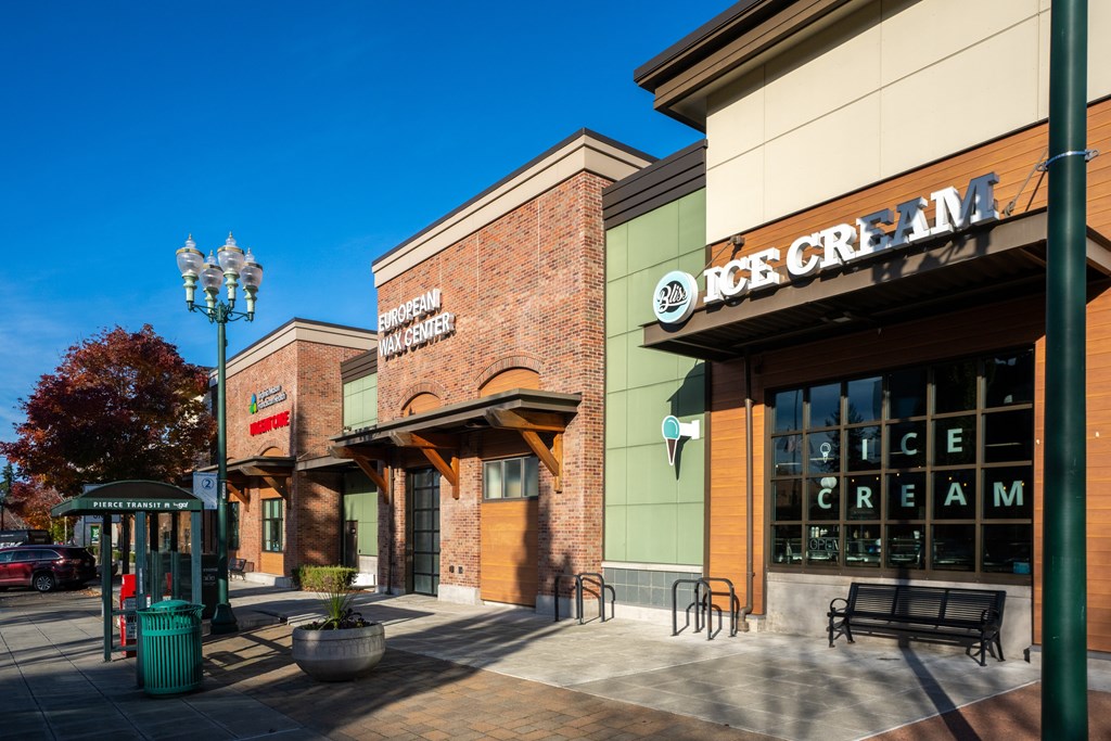 A European-themed ice cream shop is located in a plaza.
