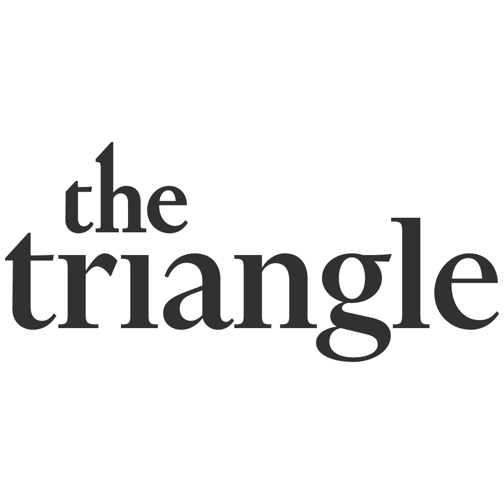 The image displays the words "the triangle" in a large, bold font.