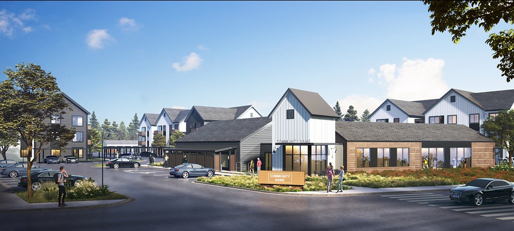 A row of houses with a person standing in front of the first one.