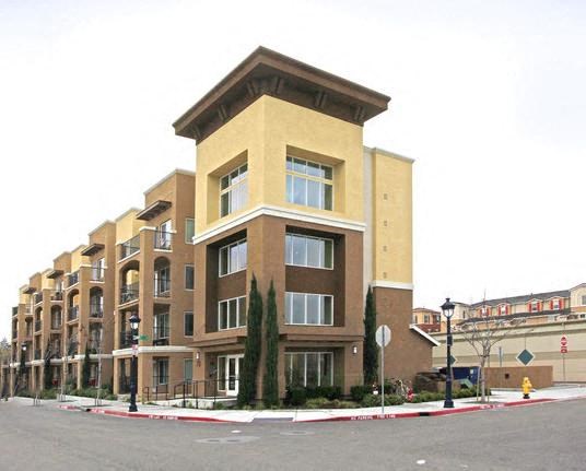 a tall building with a street in front of it