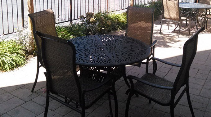 a table and chairs on a patio