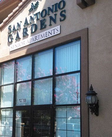 a building with a window and a sign on it
