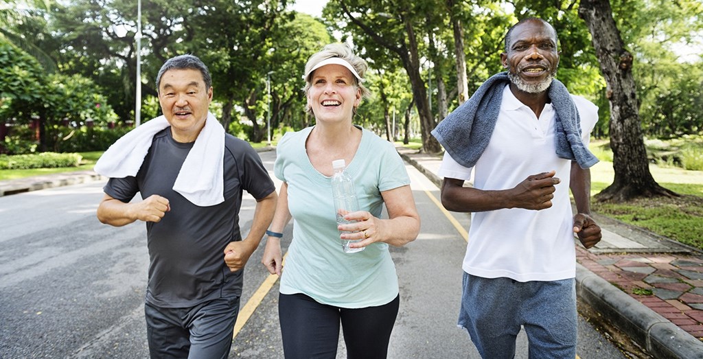 a group of people walking down the street