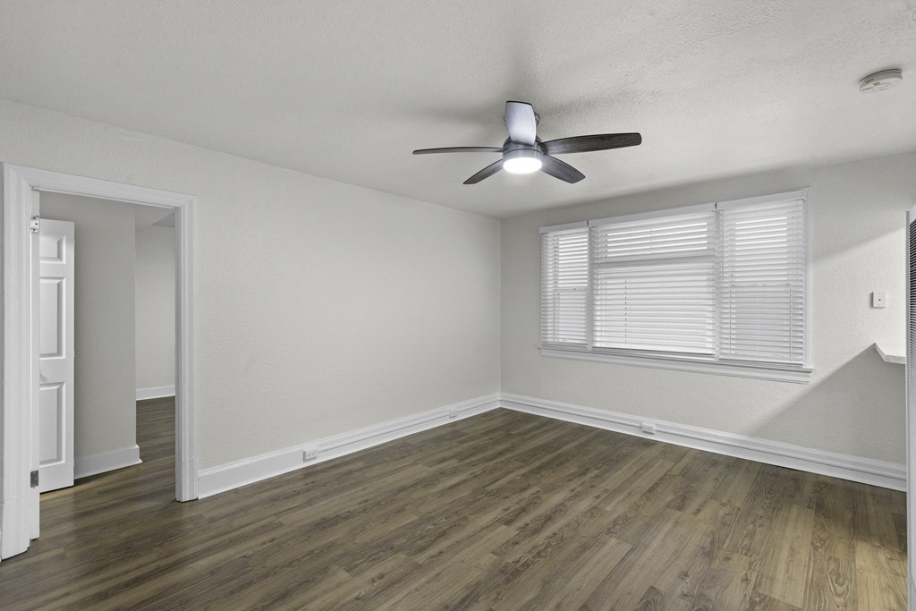 Living Room Area with hardwood floors and a ceiling fan at Carolina Court, Washington