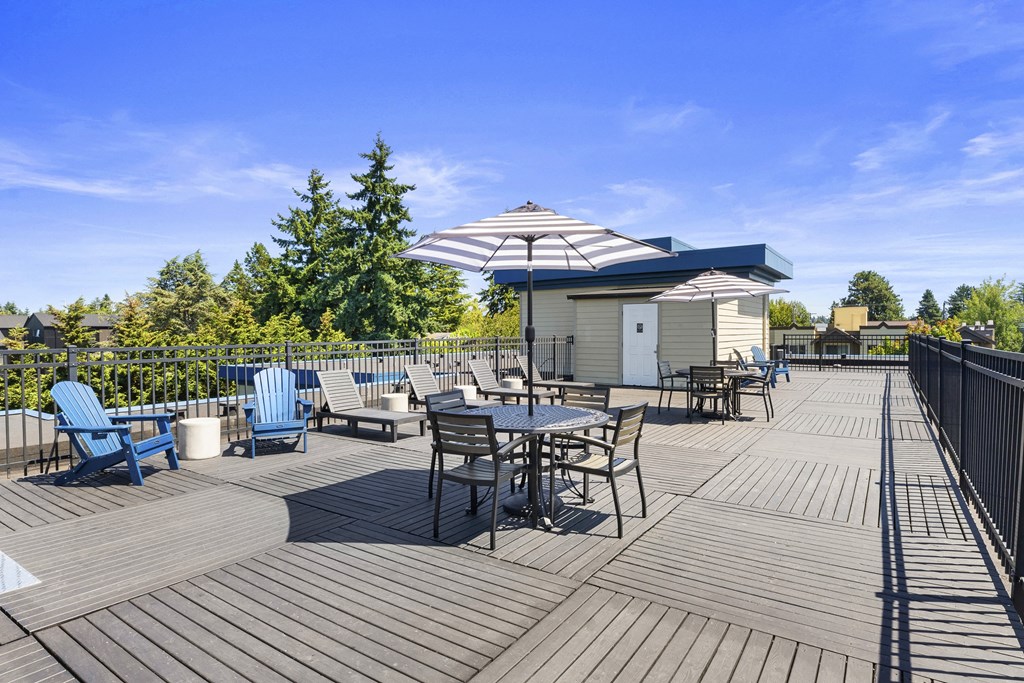Rooftop Deck with Patio Seating at Guinevere Apartment Homes, Washington, 98103