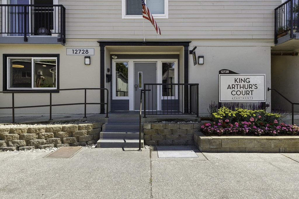 Front View of Property with Property Sign at King Arthurs Court, Seattle, WA