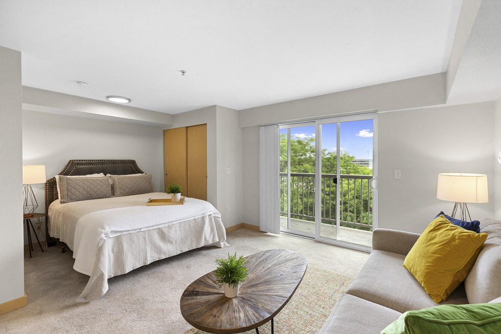 Studio Apartment with Cozy bedroom with a bed and a couch Studio Apartment with Cozy bedroom with a bed and a couch at Villaggio Apartment Homes, Tacoma, WA