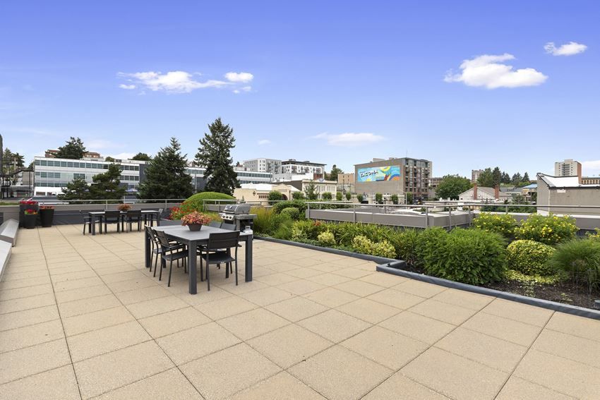 Resident Lounge on the Rooftop with a dining table and chairs Resident Lounge on the Rooftop with a dining table and chairs at Villaggio Apartment Homes, Tacoma - Photo Gallery