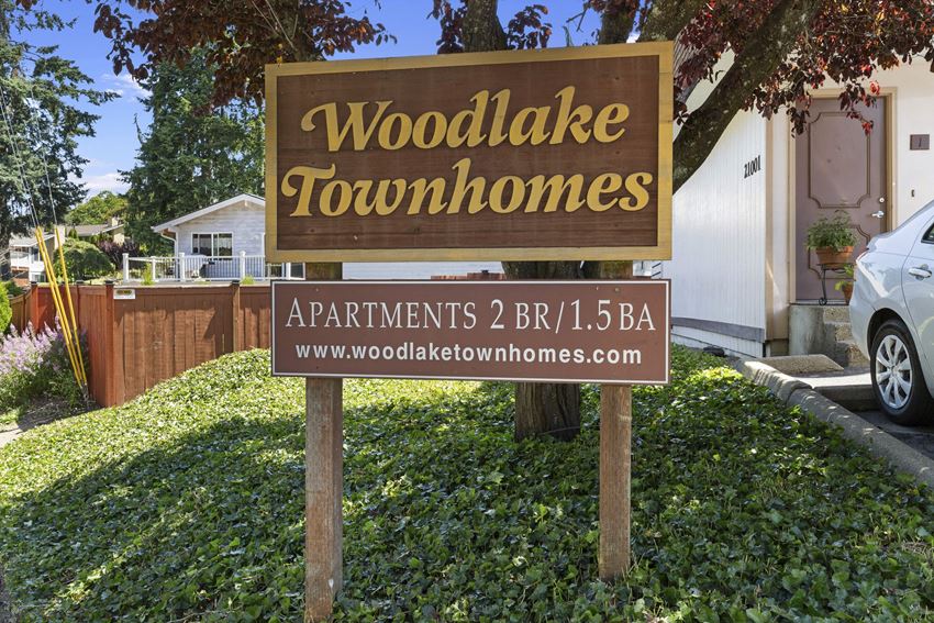 Property Signage with Grass Area underneath Property Signage with Grass Area underneath at Woodlake Townhomes, Edmonds, 98026 - Photo Gallery