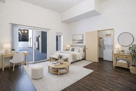 A modern bedroom with a white bed and a wooden floor.