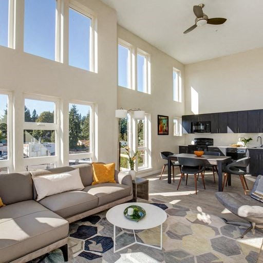 a living room with a couch and a table