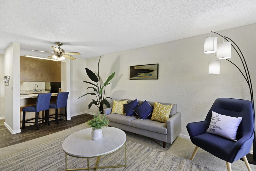 a living room with a couch and a coffee table at Pacific Park Apartment Homes, Edmonds, WA