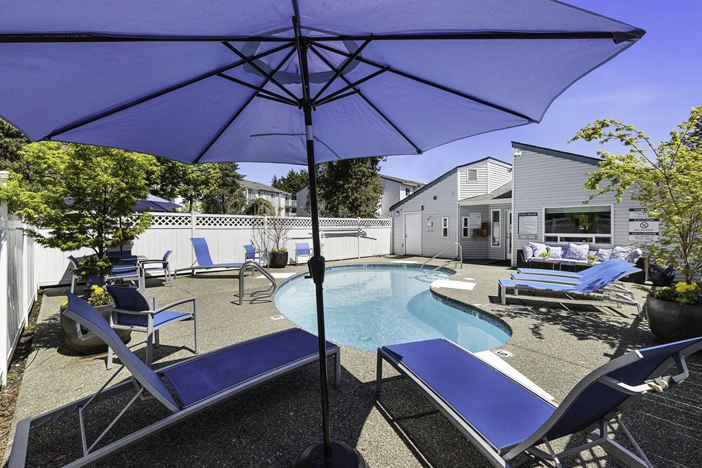 take a dip in the pool at the enclave at woodbridge apartments in sugar land, tx