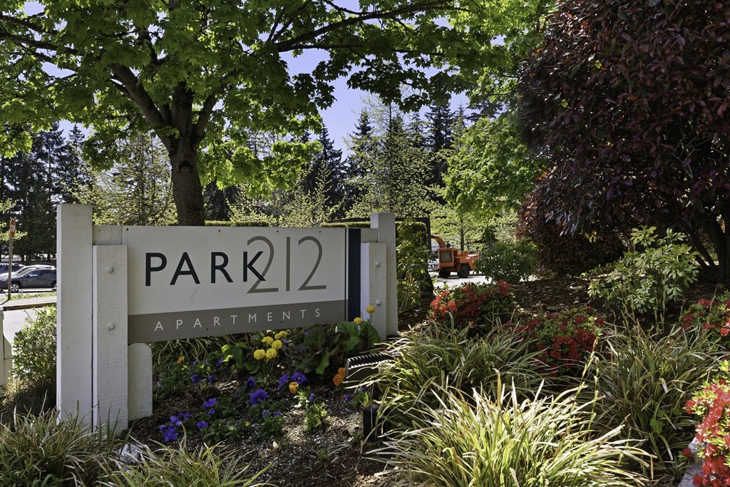 a park with a sign that says park 22 apartments