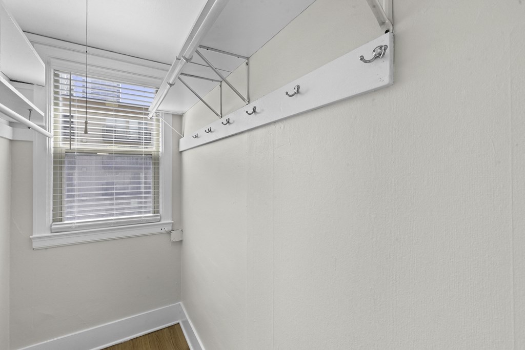 Expansive closet with a large window with built in shelving at Stockbridge Apartment Homes, Seattle, WA