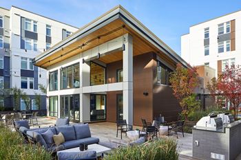Outdoor Terrace with Ping Pong & BBQs at Postmark Apartments, Shoreline, WA 98155