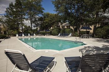 Swimming Pool With Relaxing Sundecks at Amberly Apartments, Michigan