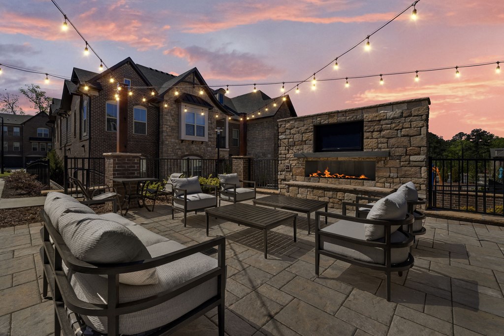 patio with fireplace and seating area at Griffin Weston, North Carolina, 27513