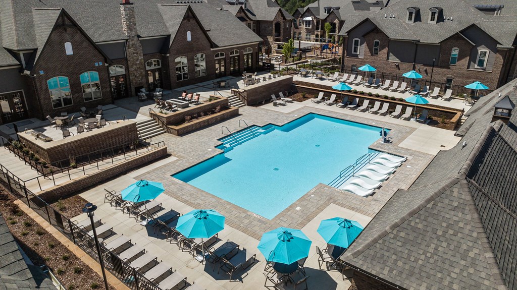 an aerial view of the resort style pool with lounge chairs and umbrellas at Griffin Weston, North Carolina