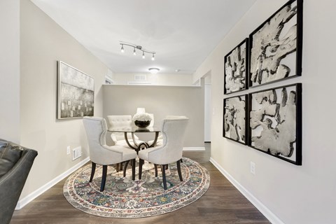 a dining room with a table and chairs  at Northridge, Rochester Hills, MI