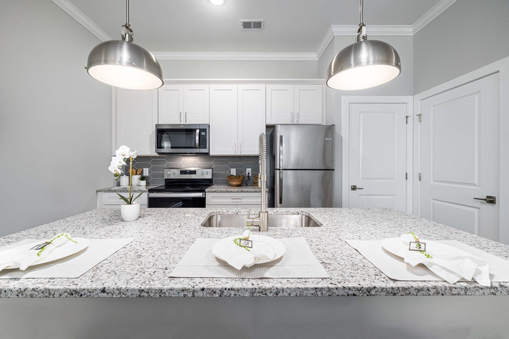 The Edwards Kitchen With Granite and Stainless countertops steel appliances at Griffin Weston, North Carolina