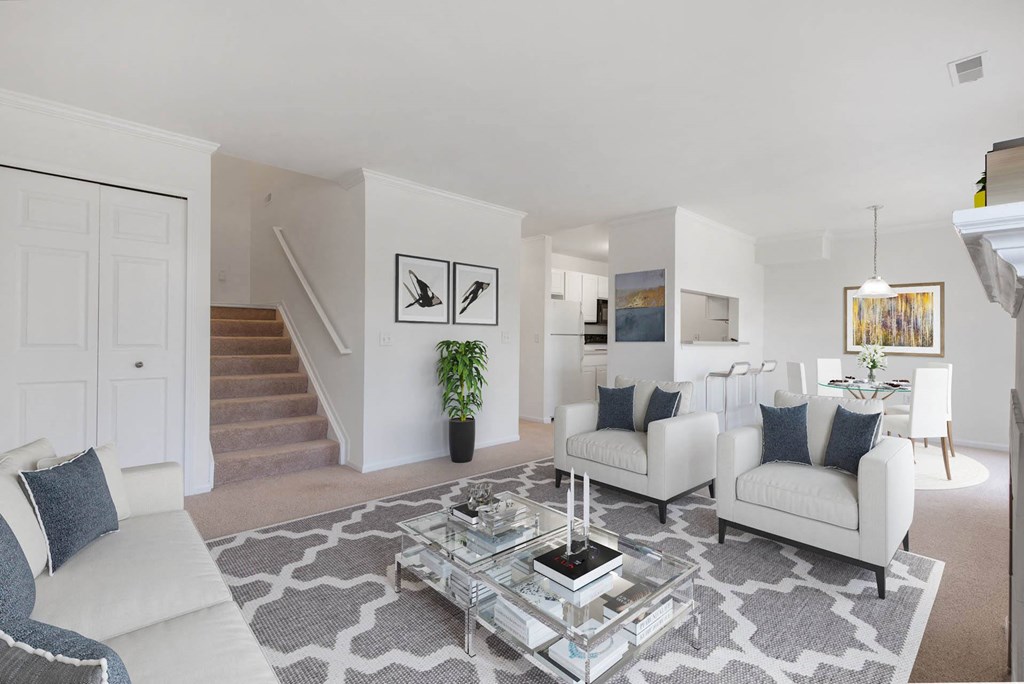 Living Room With Loft Staircase at Brownstones, Novi