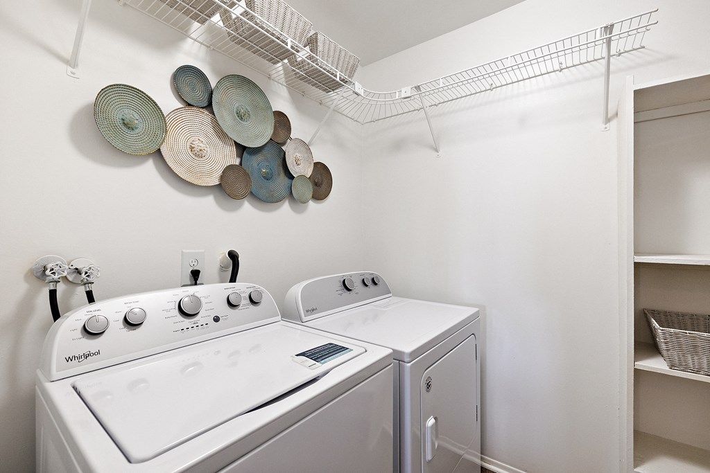 a washer and dryer in the laundry room  at Northridge, Rochester Hills, Michigan
