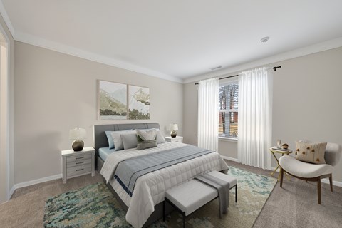 A bedroom with a large bed and a painting on the wall.