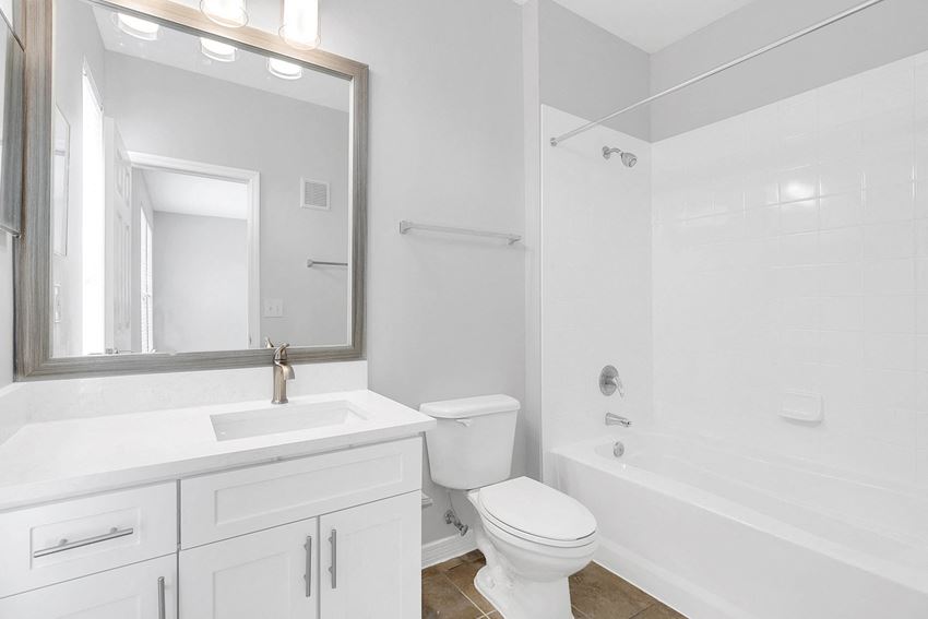 a bathroom with a sink toilet and bathtub - Photo Gallery