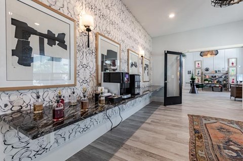 A modern living room with a black and white theme.