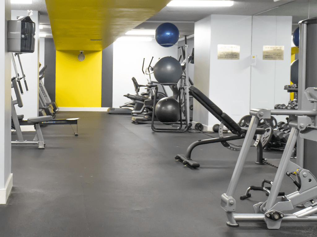 a gym with weights and other exercise equipment at The Aspen, Virginia, 22305