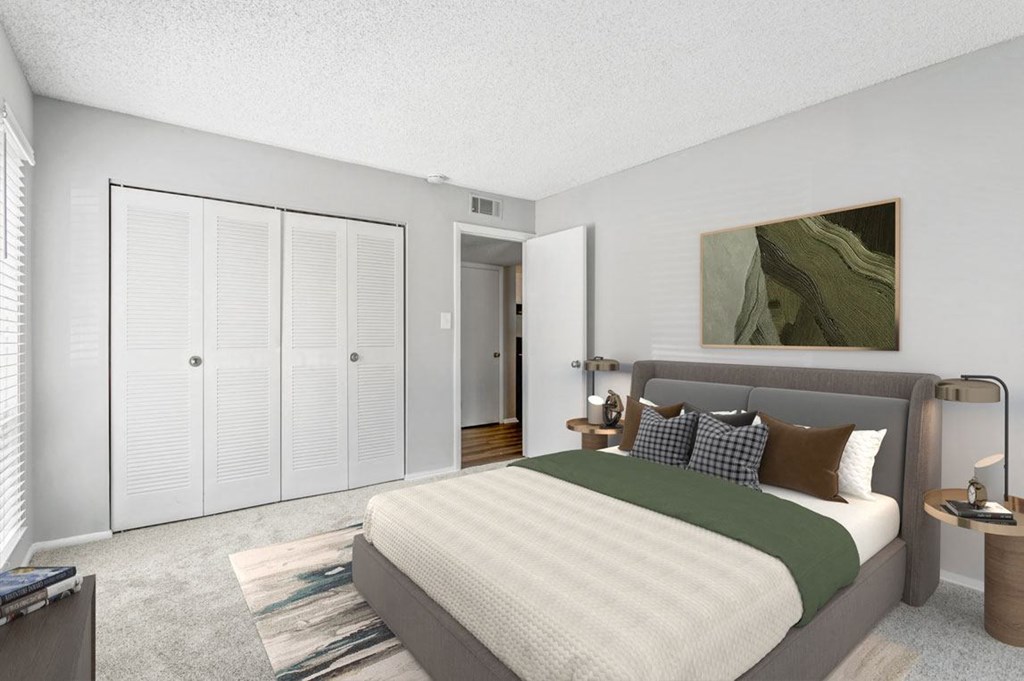 Bedroom with a Large Bed at Lakes Edge Apartments, Greensboro, North Carolina