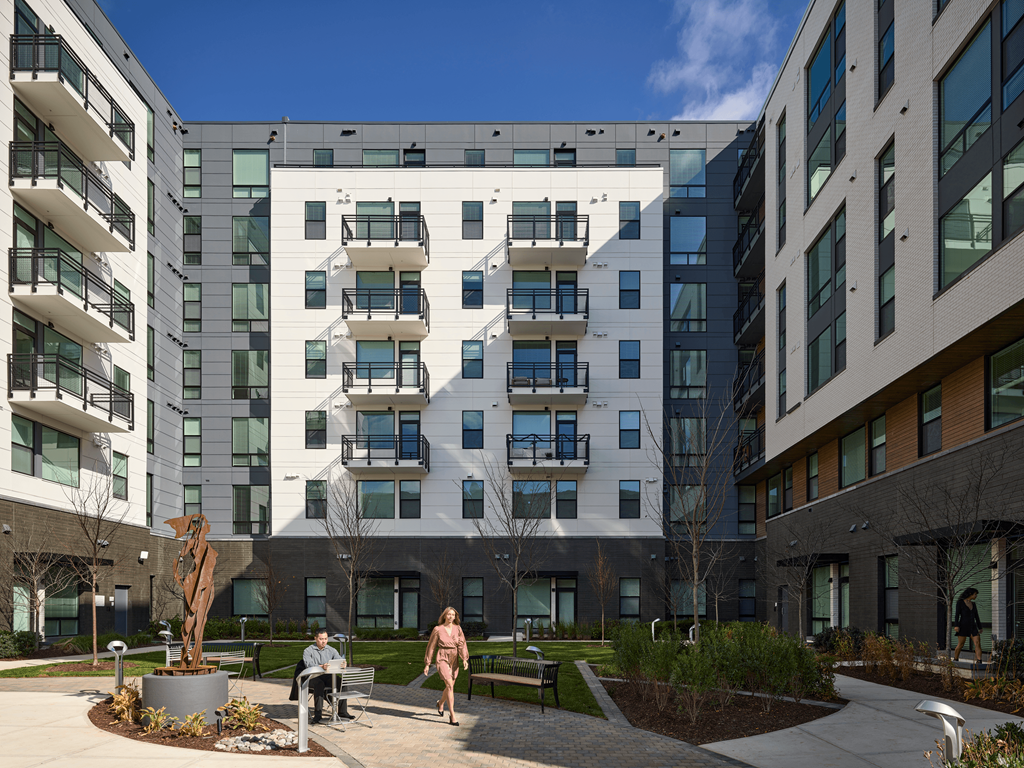 a group of buildings with people walking in front of them at Makers Rise, Virginia, 20171