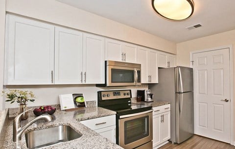 Renovated kitchen featuring stainless steel appliances  at Saratoga Square, Springfield, 22153