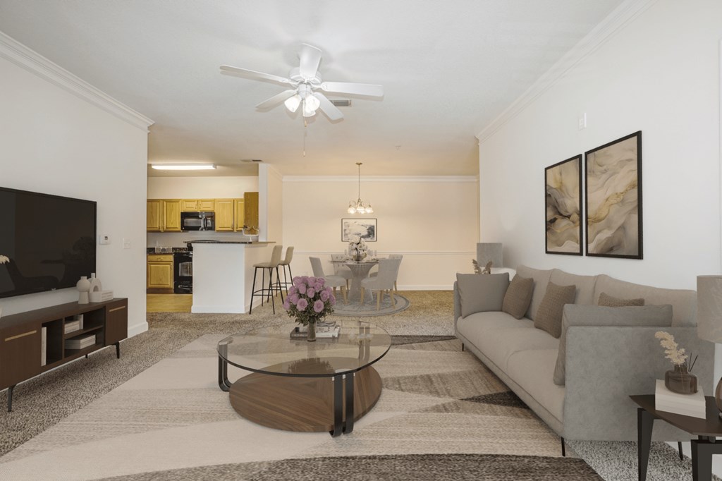 a living room with a couch and a table at Stone Gate Apartments, Spring Lake, NC