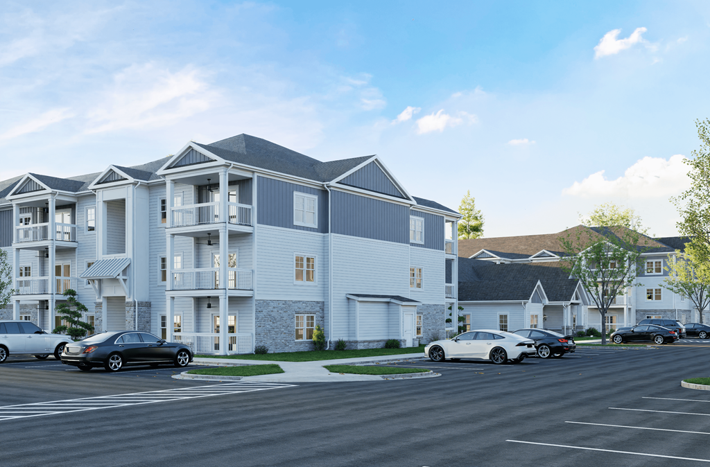 A row of houses with cars parked in front.at The Landings at Hard Scrabble, Columbia, SC 29203