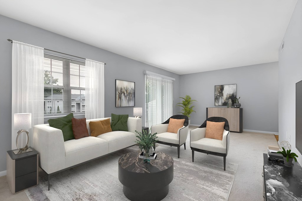 a living room with grey walls and white couches and chairs at West Pointe Apartments in Burlington, NC