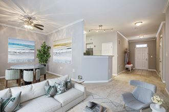 Living and Dining Room in the Maple floor plan at Woodland Park Apartments in Herndon, VA - Photo Gallery 2