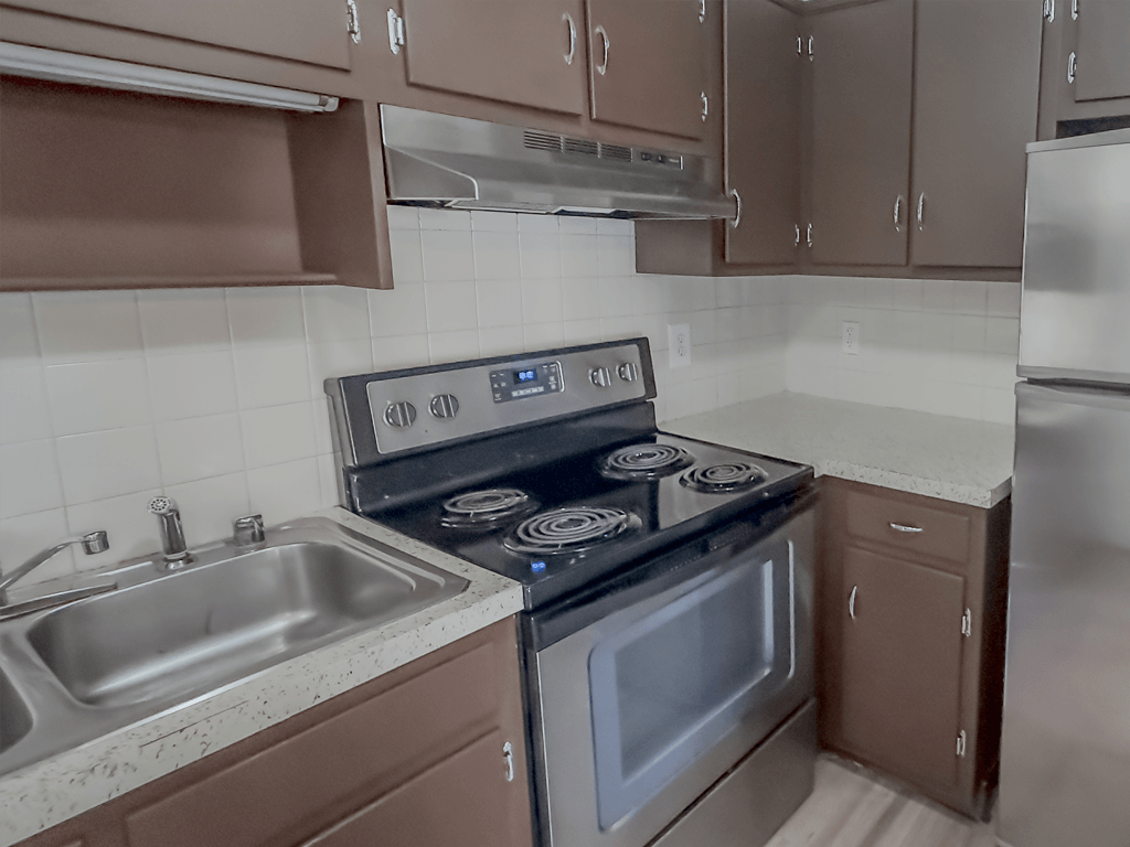 an empty kitchen with a stove and a sink at Middletown Valley, Maryland, 21769