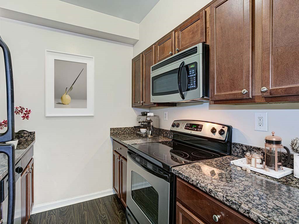 Fully Furnished Kitchen With Stainless Steel Appliances at Columbia Uptown, Washington