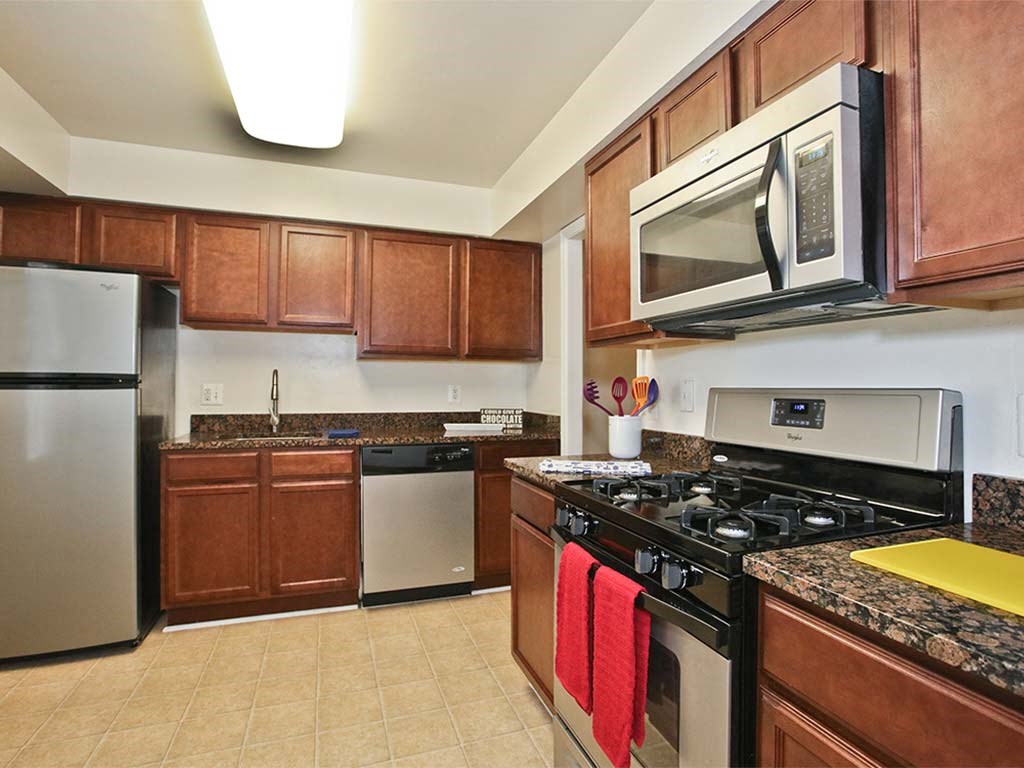 Renovated Kitchen Featuring Stainless Steel Appliances at Fairfax Square at Fairfax Square, Virginia