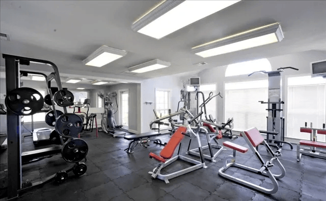 Fitness Center Fitness Center at Village on the Lake Apartments, Spring Lake