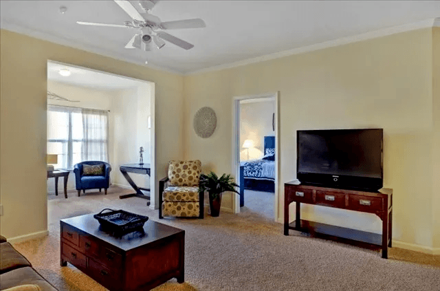 Sunroom view from Living Room at Village on the Lake Apartments, North Carolina, 28390