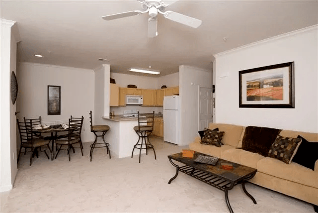 Living Room. Dining Room and Kitchen at Village on the Lake Apartments, Spring Lake, North Carolina